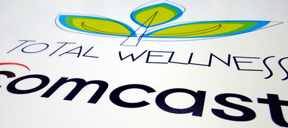 Comcast-total-wellness-logo-slanted  large